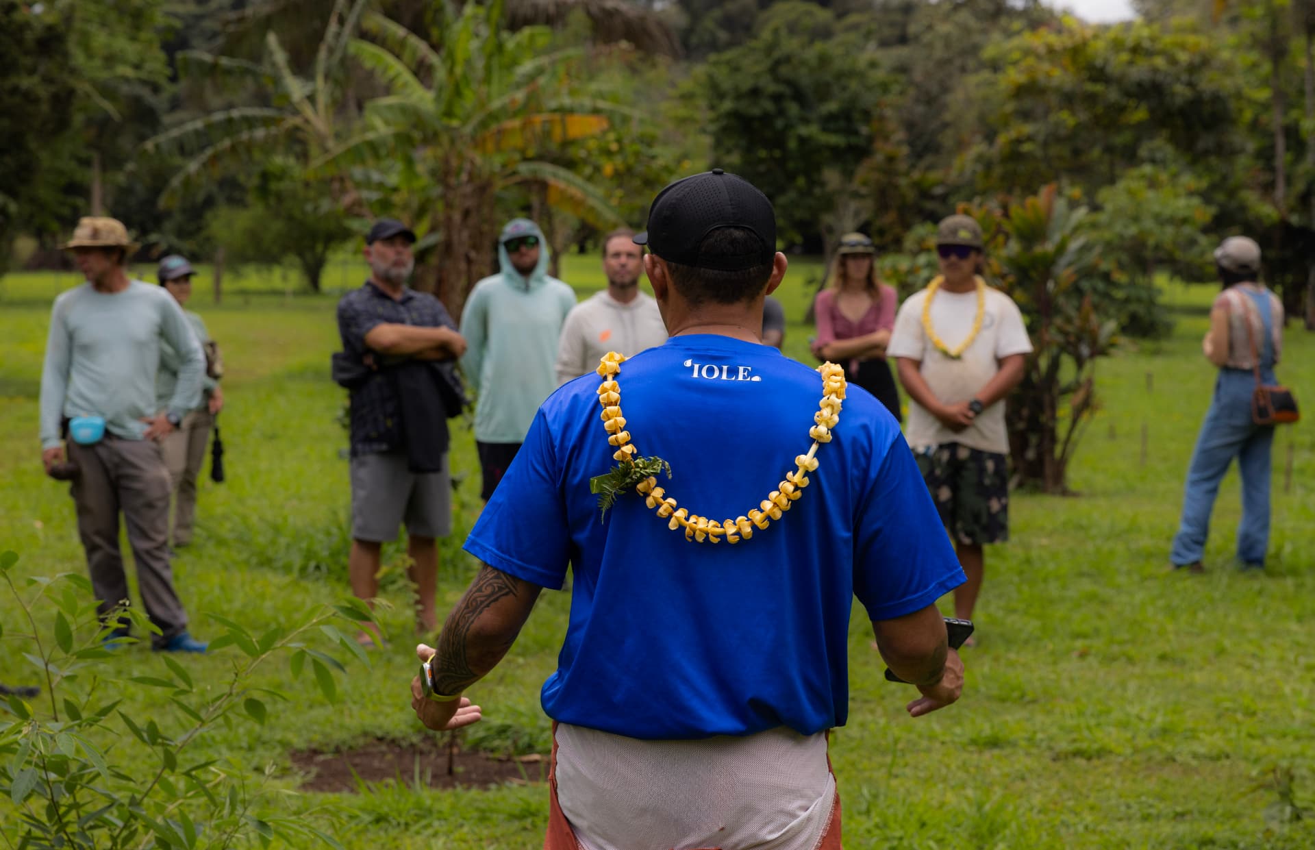 A community gathering at ʻIole in North Kohala before a native tree planting